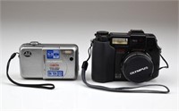 Two Olympus Camedia Cameras and Accessories