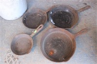 4 old frying pans