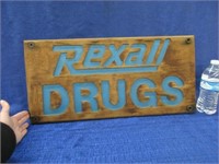vintage "rexall drugs" wooden sign 11x24