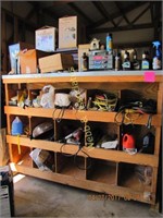 Wood 3 rack storage bin with contents: trowels,