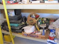 Contents of bottom shelf: tools, solvents,