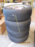 4 aluminum wheels with  #205-60-16 tires
