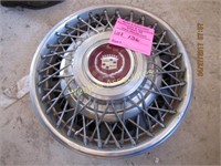 4 Cadillac wire wheel hubcaps 15”