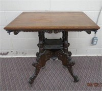Victorian carved butterprint oak parlor table