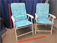 2 aqua color folding lawn chairs