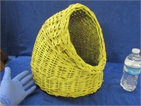 old yellow wicker cat basket bed