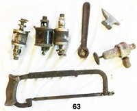 Lot: Three oilers; wrench; mini anvil &c.