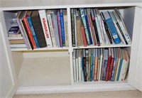 Three shelves of books