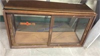 Antique display case w/Rock Island sticker