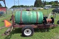 GREEN CHEMICAL TANK WITH SPRAYER ON WHEELS