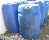 (2) Plastic 55 Gallon drums. Measure 37" tall.