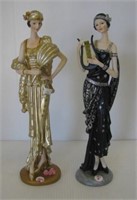 Pair of Turtle King Corp. Flapper girl figurines.