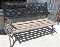 Cast iron and wood park bench. Measures 50" wide.