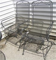 (2) Wrought iron patio chairs.