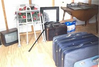luggage,table,TVs, & remaining contents of bld.