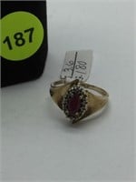 10K YELLOW GOLD RING WITH RED SAPPHIRE CENTER GEMS