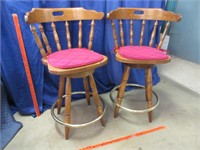2 swivel bar stools (maroon cush.)24in seat height