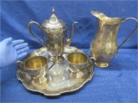 fancy plated beverage set on tray & water pitcher
