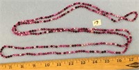 68" strand of tiny stone beads - purples and pinks