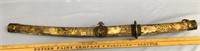 28" oriental sword in a brass ornate sheath - has