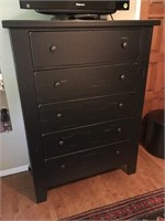 Attic Heirlooms 5 Drawer Distressed Dresser by
