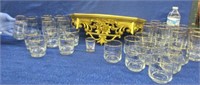 29 vintage indy 500 glasses & gold shelf (plastic)