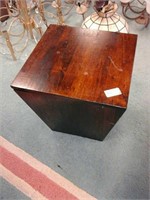 Unique shaped wood storage table