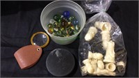 Group of old toys, glass marbles, chess set,