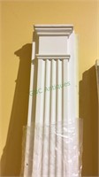 Two matched pair or white plastic columns , each