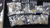 11 bags of charms, including snowman, cars, fish