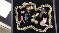 Costume jewelry including brooches, Silvertone