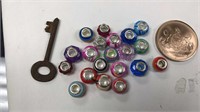 Glass beads with collars marked 9 to 5,