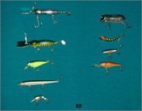 Lot of 9 fishing lures & sinkers and hooks.