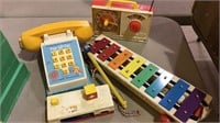 Four classic 1960's fisher price toys , clock