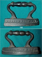 Sad iron with integral iron handle