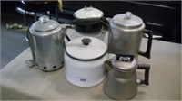 coffee pots, enamelware coffee pots and a tea pot