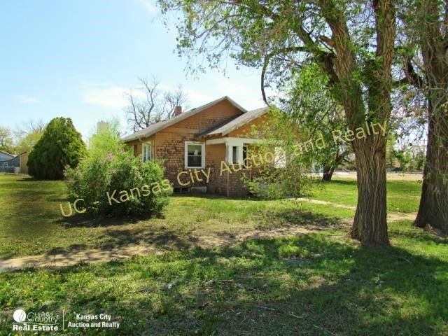 Investment Home with 2 lots in Cimarron, KS