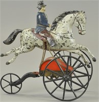 EARLY AMERICAN CLOCKWORK MAN RIDING HORSE TOY