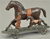 EARLY AMERICAN TWO HORSE & FIGURE PLATFORM TOY