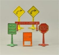 GROUPING OF SIX CAST IRON ROAD SIGNS