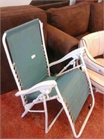 Blue and wite folding lawn chair