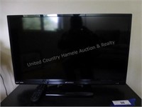 Sansui 24" flat screen TV and stand