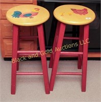 2 hand painted wooden stools