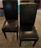TWO FAUX LEATHER DINNING ROOM CHAIRS