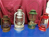 Three vintage railroad lanterns and one vintage