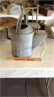 Metal watering can top and back handles