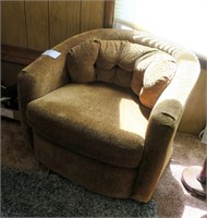 Retro upholstered swivel arm chair