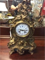 French 19th C. Louis XV th bronze mantle clock