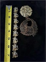 DETAILED BROOCHES