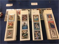 FOUR BOXES FILLED WITH MLB AND NFL TRADING CARDS